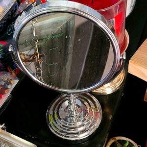 Spinning silver mirror